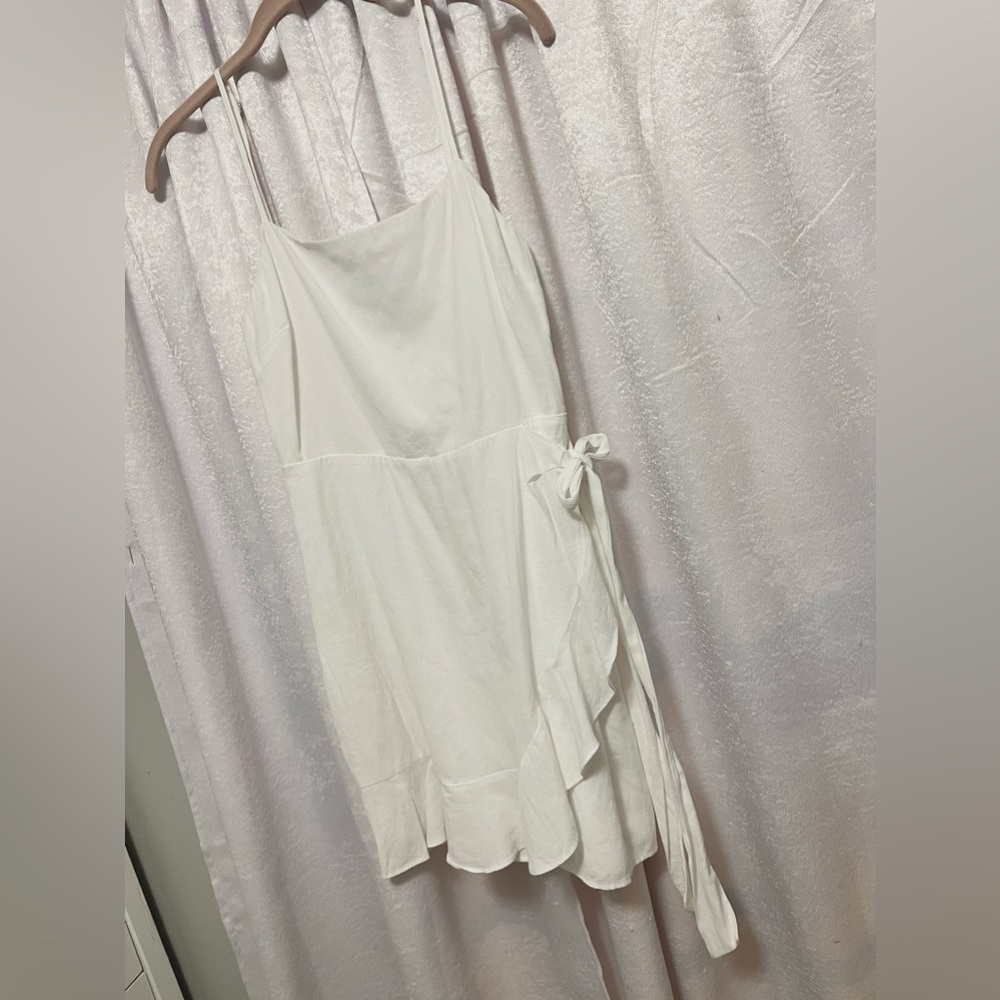 White ruffle mini dress